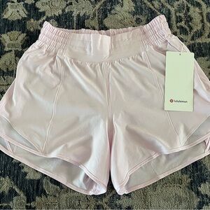 ***NWT*** Lululemon Hotty Hot HR short 4 in lined Pink.  Never worn, brand new!!